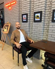 Portrait of Akram Ahmed, Co-founder and CTO of Orfloat