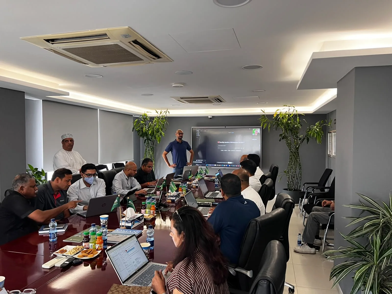 Europcar Oman staff working at their laptops during a technical AI workshop