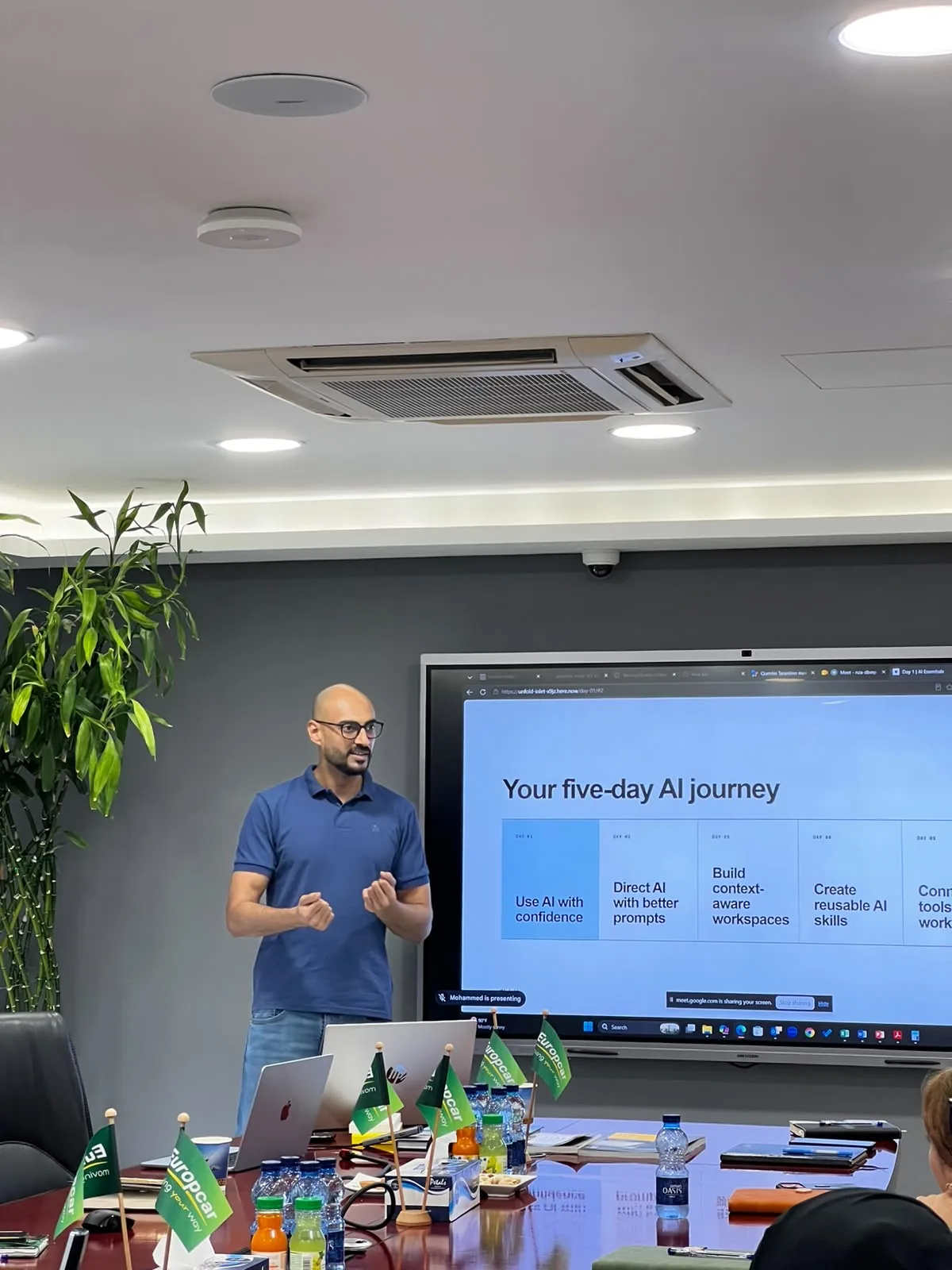 Akram Ahmed presenting the five-day AI workshop journey to Europcar Oman staff